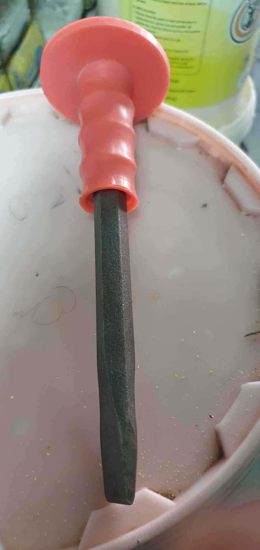 Chisel with rubber handle