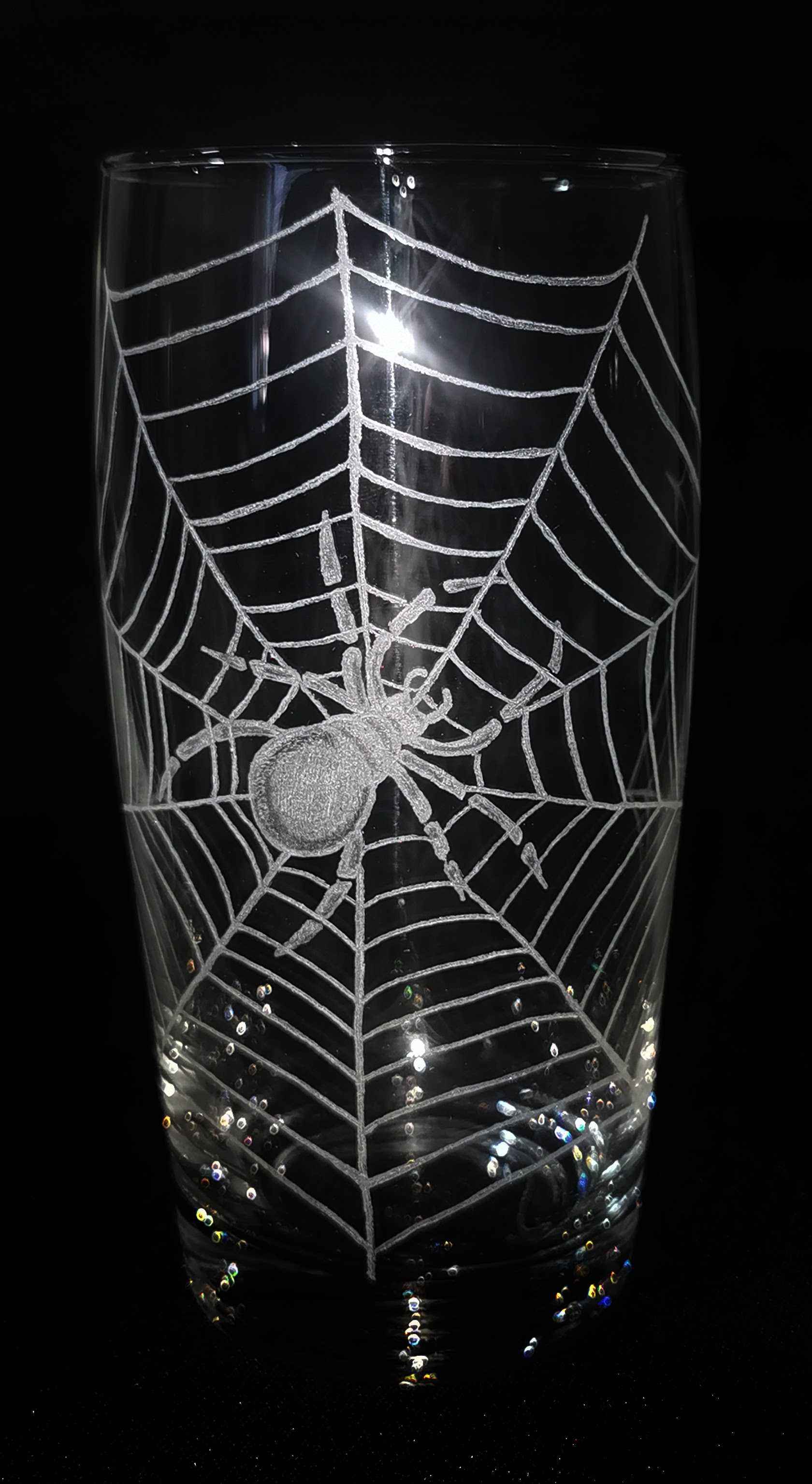 Hand engraved glass spiderweb
