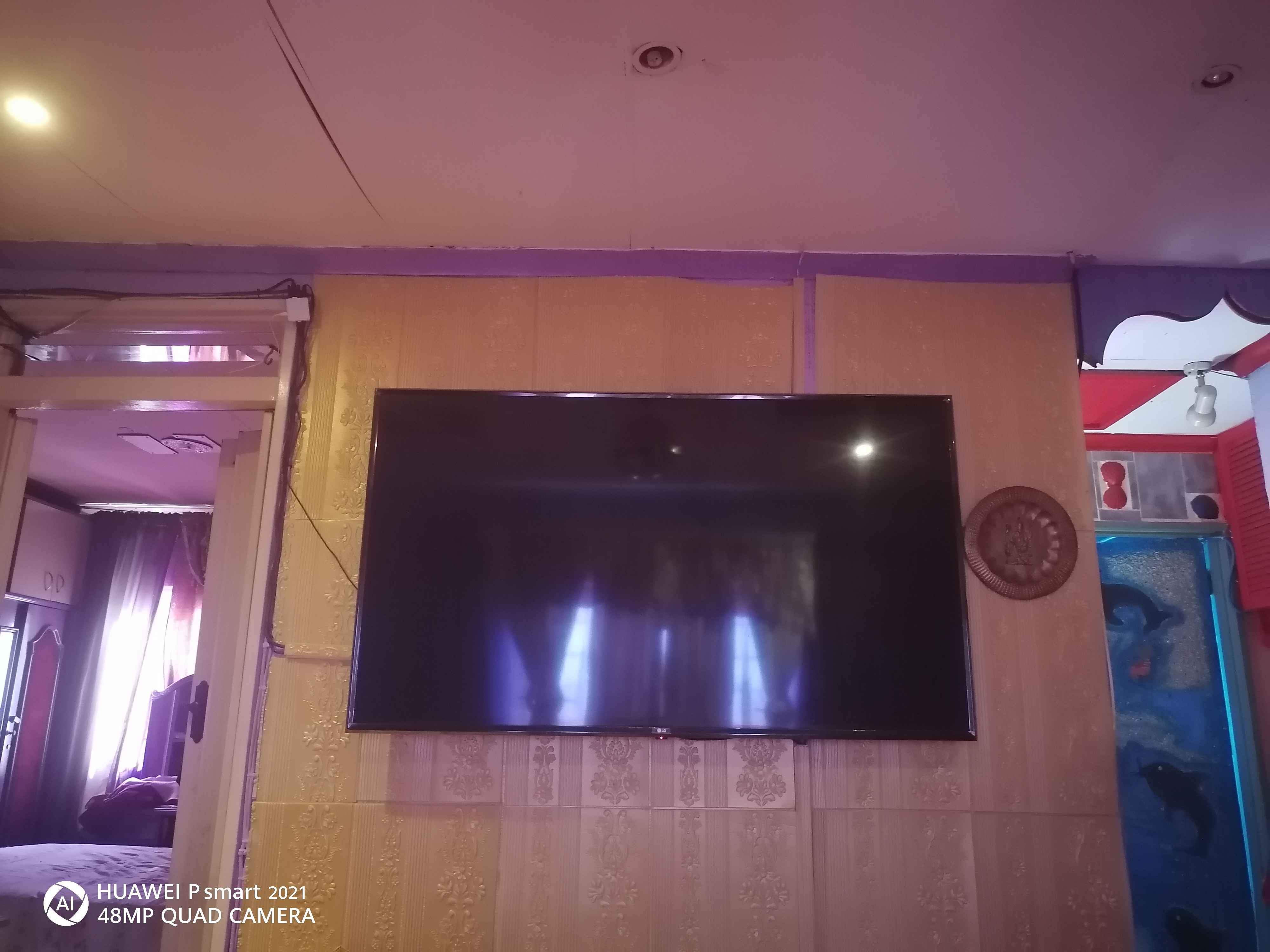 LG  (65") 4K UHD Smart TV