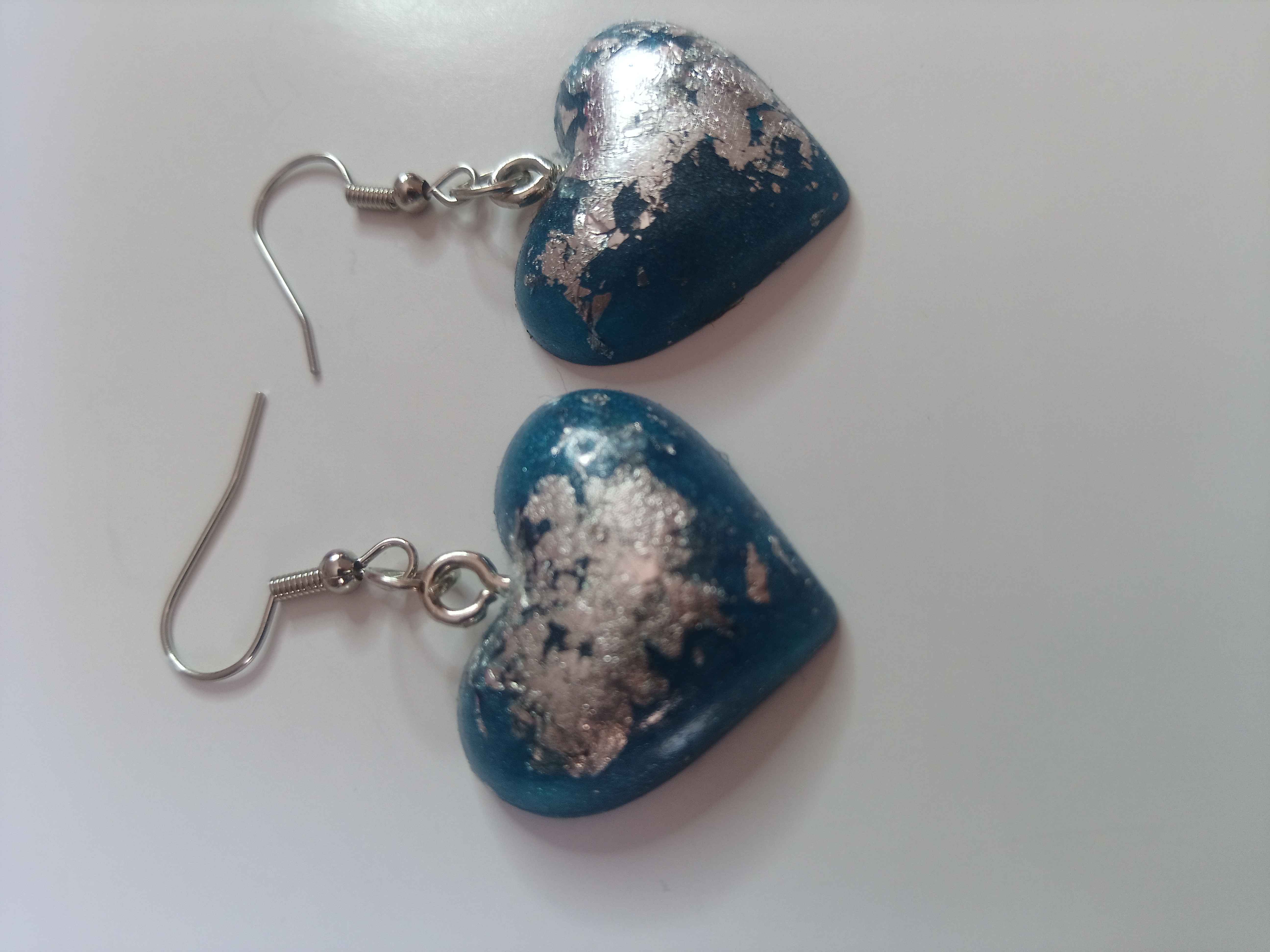 Small heart shaped blue earrings 