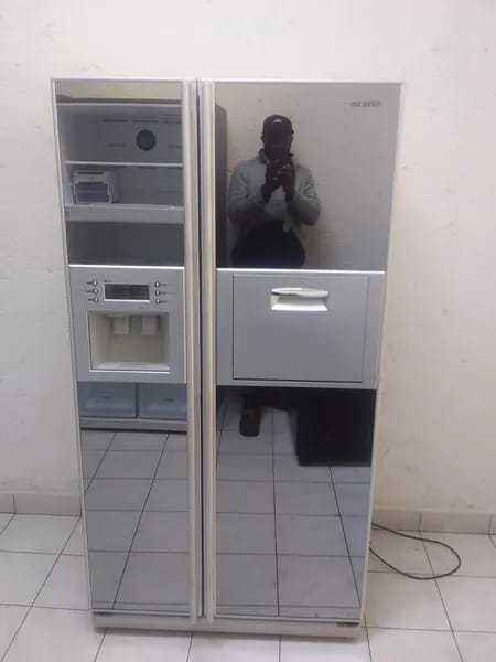 Samsung-side-by-side-refrigerator-with-water-and Ice dispenser