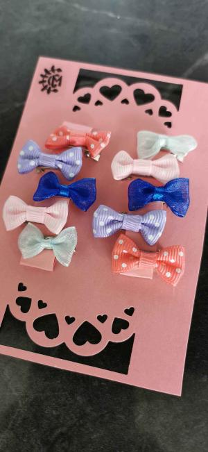 Pack of 10 mini bows 2cm