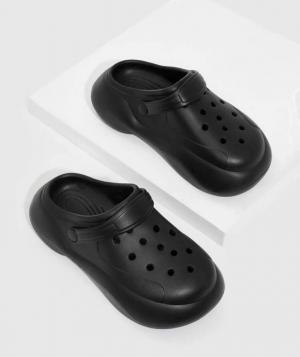black platform clogs