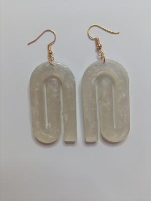 white and gold pattern earrings