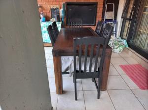 Dinning room table, 6 chairs, wine rack, 6 cushions