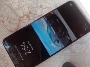 Huawei nova 8i and Bluetooth earphones