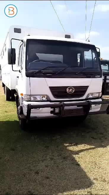 NISSAN UD80 DROPSIDE TRUCK